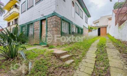 Casa com 3 quartos à venda na Rua Humberto de Campos, 383, Partenon, Porto Alegre, 200 m2 por R$ 900.000