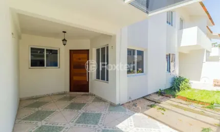 Casa em condomínio fechado com 3 quartos à venda na Avenida Prefeito Barreto Viana, 402, Cecília, Viamão, 89 m2 por R$ 276.900