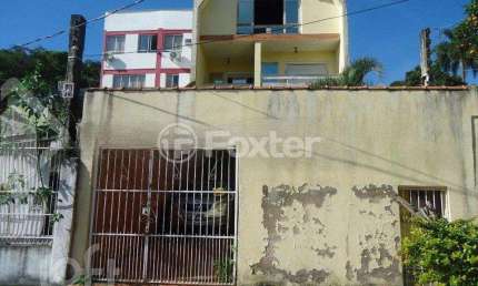 Casa com 7 quartos à venda na Rua Teixeira de Freitas, 348, Santo Antônio, Porto Alegre, 539 m2 por R$ 583.000