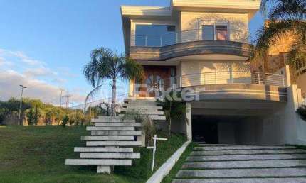 Casa em condomínio fechado com 4 quartos à venda na Avenida Senador Salgado Filho, 8500, Vila Augusta, Viamão, 534 m2 por R$ 2.750.000