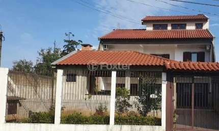 Casa com 3 quartos à venda na Quadra D Seis, 30, Guajuviras, Canoas, 303 m2 por R$ 465.500