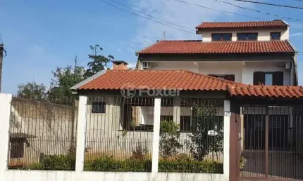 Casa com 3 quartos à venda na Quadra D Seis, 30, Guajuviras, Canoas, 303 m2 por R$ 465.500