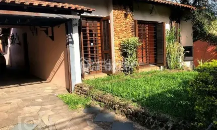 Casa com 4 quartos à venda na Rua Humberto de Campos, 68, Partenon, Porto Alegre, 280 m2 por R$ 659.000