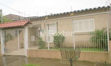 Casa com 3 quartos à venda na Rua Camoati, 48, Santa Maria Goretti, Porto Alegre, 133 m2 por R$ 750.000