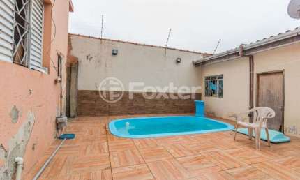 Casa com 7 quartos à venda na Rua Doutor Telmo Vergara, 832, Partenon, Porto Alegre, 440 m2 por R$ 1.045.000