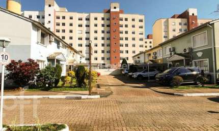 Casa em condomínio fechado com 3 quartos à venda na Avenida Santos Ferreira, 1180, Marechal Rondon, Canoas, 78 m2 por R$ 370.000