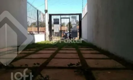 Casa com 3 quartos à venda na Rua Irmã Teresilda Steffen, 436, Mário Quintana, Porto Alegre, 130 m2 por R$ 450.000