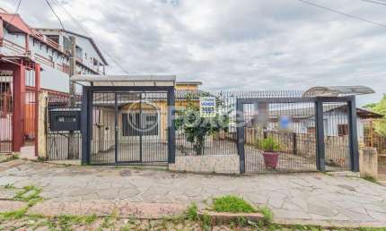 Casa com 3 quartos à venda na Rua Padre João Batista Reus, 2452, Vila Conceição, Porto Alegre, 265 m2 por R$ 997.500