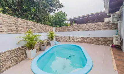 Casa em condomínio fechado com 4 quartos à venda na Estrada João Salomoni, 600, Vila Nova, Porto Alegre, 191 m2 por R$ 890.000