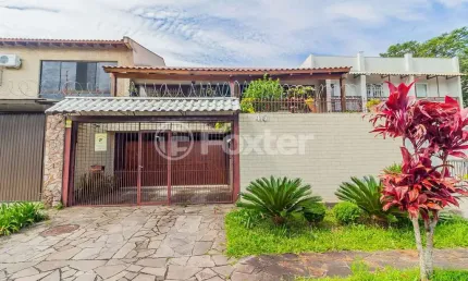 Casa com 4 quartos à venda na Rua Lloyd de Andrade Polidoro, 45, Ipanema, Porto Alegre, 237 m2 por R$ 803.225