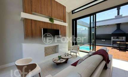 Casa em condomínio fechado com 4 quartos à venda na Rua Honorio Ferreira Da Silva, 2009, Arco Íris, Capão da Canoa, 185 m2 por R$ 1.770.000