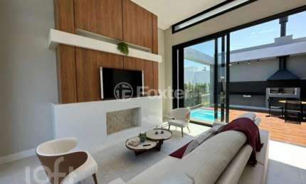 Casa em condomínio fechado com 4 quartos à venda na Rua Honorio Ferreira Da Silva, 2009, Arco Íris, Capão da Canoa, 185 m2 por R$ 1.770.000
