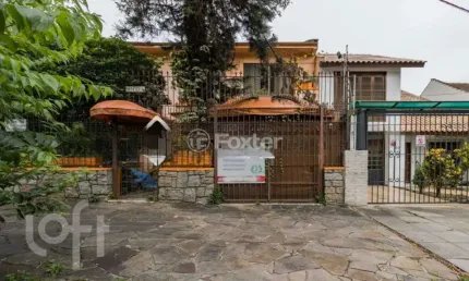 Casa com 5 quartos à venda na Rua Santos Neto, 40, Petrópolis, Porto Alegre, 200 m2 por R$ 780.000