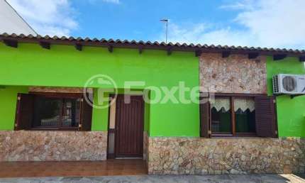 Casa com 3 quartos à venda na Rua Taimbé, 106, Sumaré, Alvorada, 164 m2 por R$ 405.000