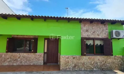 Casa com 3 quartos à venda na Rua Taimbé, 106, Sumaré, Alvorada, 164 m2 por R$ 405.000