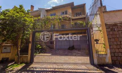Casa com 5 quartos à venda na Rua Isidoro Tressi, 507, Jardim Botânico, Porto Alegre, 380 m2 por R$ 1.530.000