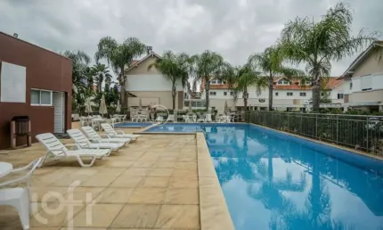 Casa em condomínio fechado com 3 quartos à venda na Avenida Açucena, 650, Estância Velha, Canoas, 156 m2 por R$ 1.050.000