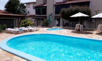 Casa em condomínio fechado com 2 quartos à venda na Rua Dos Cravos, 3705, Capão Novo, Capão da Canoa, 67 m2 por R$ 340.000