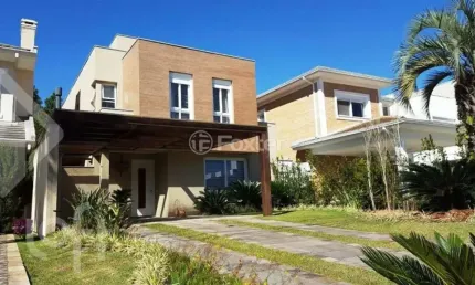 Casa em condomínio fechado com 3 quartos à venda na Avenida Juca Batista, 8000, Belém Novo, Porto Alegre, 243 m2 por R$ 1.500.000