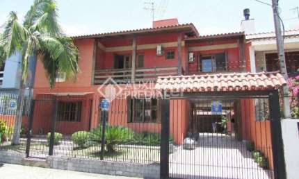 Casa com 4 quartos à venda na Rua Dom Jaime de Barros Câmara, 276, Sarandi, Porto Alegre, 320 m2 por R$ 890.000