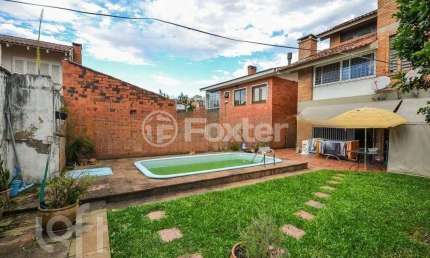 Casa com 4 quartos à venda na Rua Folha da Tarde, 194, Cristal, Porto Alegre, 300 m2 por R$ 1.400.000
