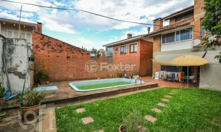 Casa com 4 quartos à venda na Rua Folha da Tarde, 194, Cristal, Porto Alegre, 300 m2 por R$ 1.400.000