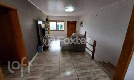 Casa com 4 quartos à venda na Rua Latino Coelho, 294, Estância Velha, Canoas, 180 m2 por R$ 550.000