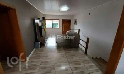 Casa com 4 quartos à venda na Rua Latino Coelho, 294, Estância Velha, Canoas, 180 m2 por R$ 550.000