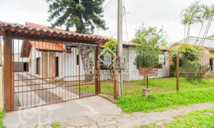 Casa com 4 quartos à venda na Avenida Guarujá, 199, Guarujá, Porto Alegre, 226 m2 por R$ 579.990