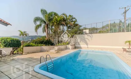 Casa em condomínio fechado com 3 quartos à venda na Rua Manoel Lopes Meirelles, 287, Jardim Itu Sabará, Porto Alegre, 106 m2 por R$ 650.000