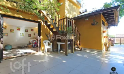 Casa em condomínio fechado com 4 quartos à venda na avenida juca batista, 1490, cavalhada, porto alegre, 400 m2 por r$ 1.490.000