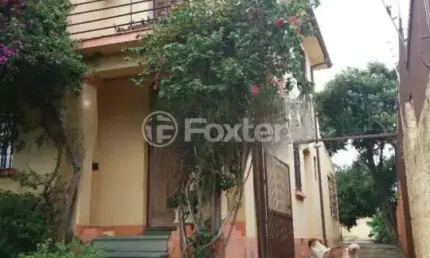 Casa com 3 quartos à venda na rua oscar schneider, 47, medianeira, porto alegre, 260 m2 por r$ 750.000