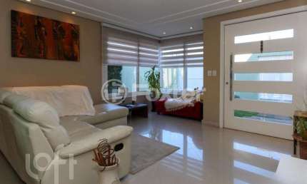 Casa com 3 quartos à venda na Rua Vereador Alcides Nascimento, 67, Rio Branco, Canoas, 185 m2 por R$ 1.210.000