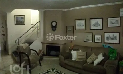 Casa com 3 quartos à venda na Rua Marina Sirângelo Castello, 49, Jardim Itu Sabará, Porto Alegre, 249 m2 por R$ 750.000