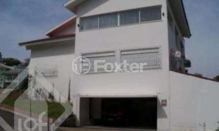 Casa em condomínio fechado com 3 quartos à venda na Rua Adriano Pereira da Silva, 450, Vila Nova, Porto Alegre, 340 m2 por R$ 1.376.820