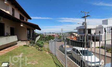 Casa em condomínio fechado com 5 quartos à venda na Rua Alcebíades Antônio dos Santos, 356, Nonoai, Porto Alegre, 433 m2 por R$ 2.200.000