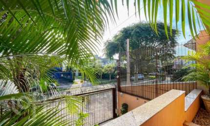 Casa com 4 quartos à venda na Rua Estácio de Sá, 371, Chácara das Pedras, Porto Alegre, 421 m2 por R$ 2.200.000