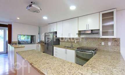 Casa em condomínio fechado com 3 quartos à venda na Avenida Juca Batista, 8000, Belém Novo, Porto Alegre, 240 m2 por R$ 1.368.000