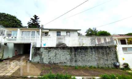 Casa com 3 quartos à venda na Rua Epitácio Pessoa, 607, Primavera, Novo Hamburgo, 200 m2 por R$ 700.000