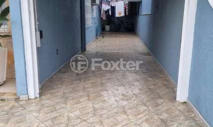 Casa com 3 quartos à venda na Rua Santiago, 482, Sumaré, Alvorada, 1630 m2 por R$ 590.000