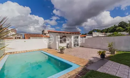 Casa com 4 quartos à venda na Rua Delfino Riet, 350, Santo Antônio, Porto Alegre, 414 m2 por R$ 1.064.000