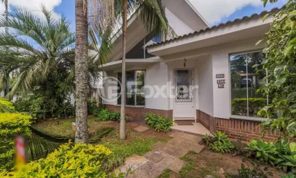 Casa em condomínio fechado com 4 quartos à venda na Rodovia Tapir Rocha, 6614, São Lucas, Viamão, 300 m2 por R$ 921.500