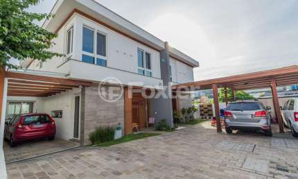 Casa em condomínio fechado com 3 quartos à venda na Avenida Clemenciano Barnasque, 121, Teresópolis, Porto Alegre, 221 m2 por R$ 1.490.000