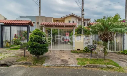 Casa com 3 quartos à venda na Rua Helio Felix Frey, 137, Espírito Santo, Porto Alegre, 126 m2 por R$ 515.000