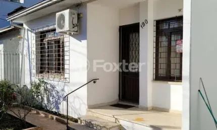 Casa com 6 quartos à venda na Rua Ibirubá, 190, Cavalhada, Porto Alegre, 244 m2 por R$ 650.000
