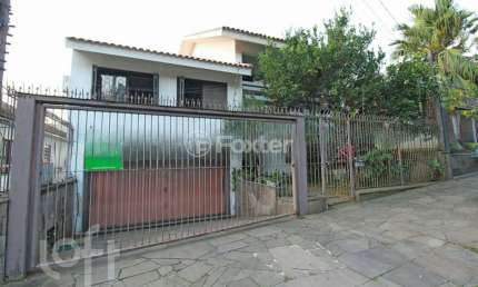 Casa com 5 quartos à venda na Rua Senegal, 230, Vila Ipiranga, Porto Alegre, 450 m2 por R$ 930.000