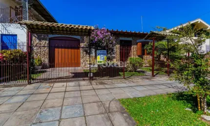 Casa com 3 quartos à venda na Avenida Irene Ruperti, 179, Parque Santa Fé, Porto Alegre, 155 m2 por R$ 549.000