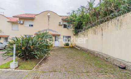 Casa em condomínio fechado com 2 quartos à venda na Avenida Edgar Pires de Castro, 350, Hípica, Porto Alegre, 118 m2 por R$ 314.000