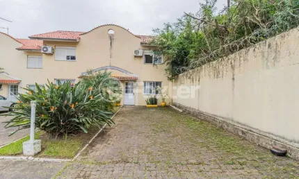 Casa em condomínio fechado com 2 quartos à venda na Avenida Edgar Pires de Castro, 350, Hípica, Porto Alegre, 118 m2 por R$ 314.000