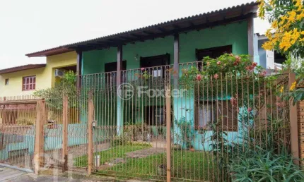 Casa com 4 quartos à venda na Rua Osmar Amaro de Freitas, 74, Jardim Itu Sabará, Porto Alegre, 283 m2 por R$ 800.000